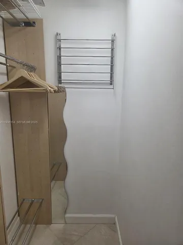 a kitchen with stainless steel appliances granite countertop a sink and a stove