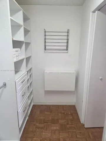 a bathroom with a toilet and a bathtub