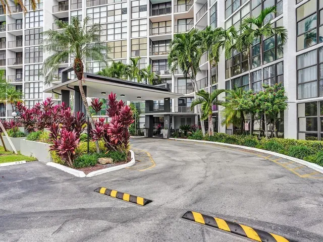 a view of street with tall buildings