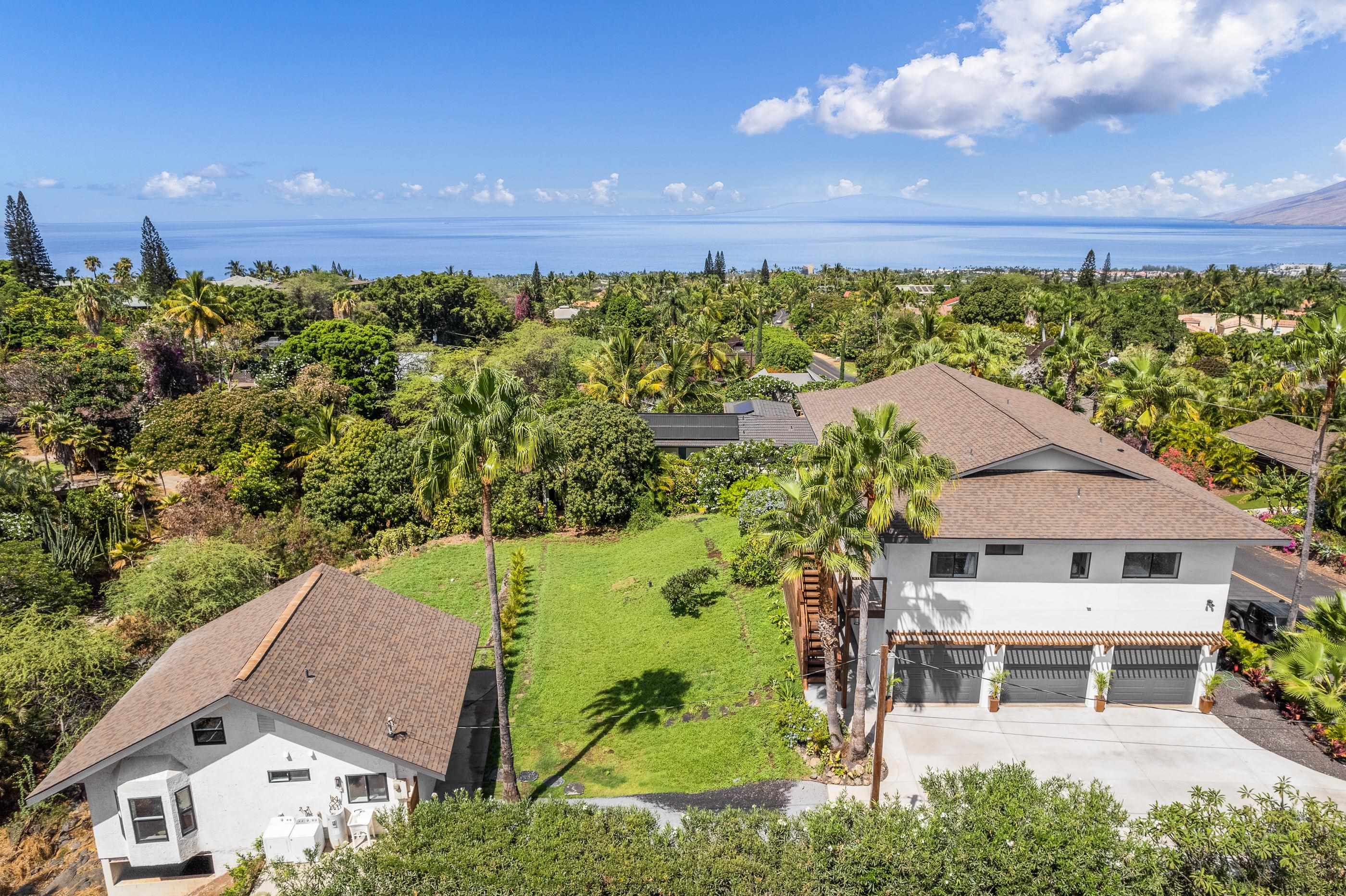 820 Kupulau Drive Kihei, HI 96753 - Photo 2 of 50 an aerial view of a house with a garden