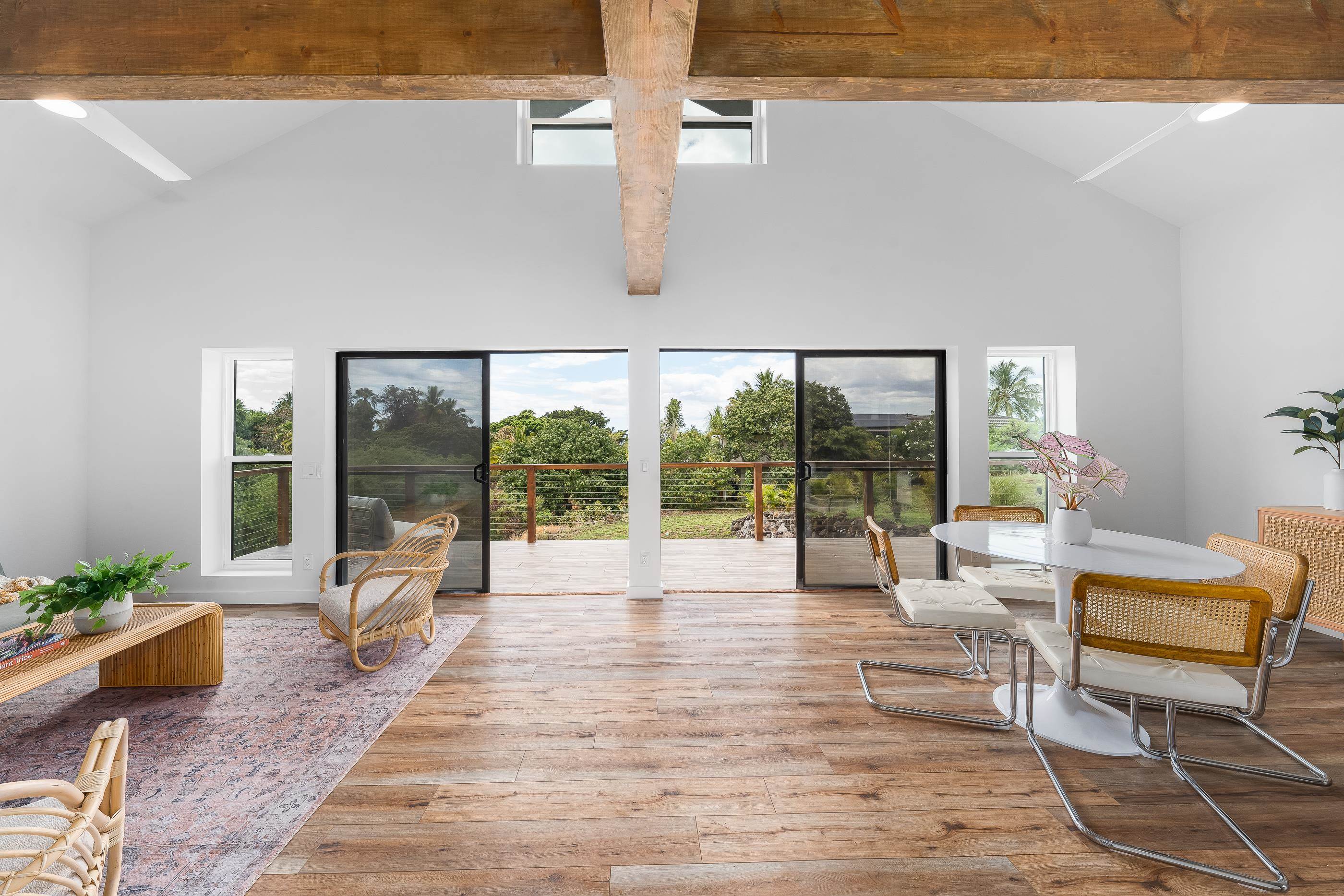820 Kupulau Drive Kihei, HI 96753 - Photo 39 of 50 a living room with furniture and a large window