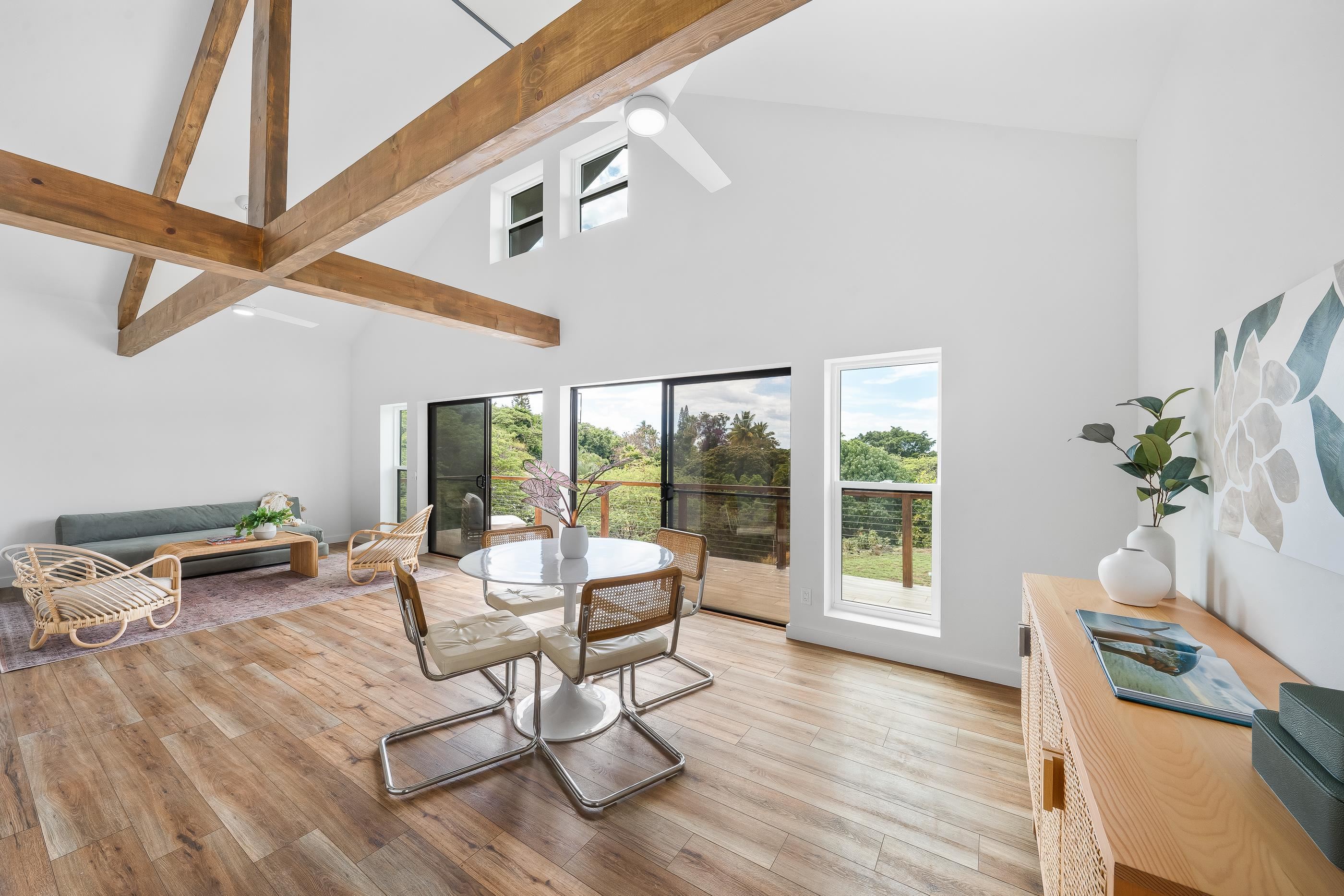 820 Kupulau Drive Kihei, HI 96753 - Photo 40 of 50 a living room with furniture and wooden floor