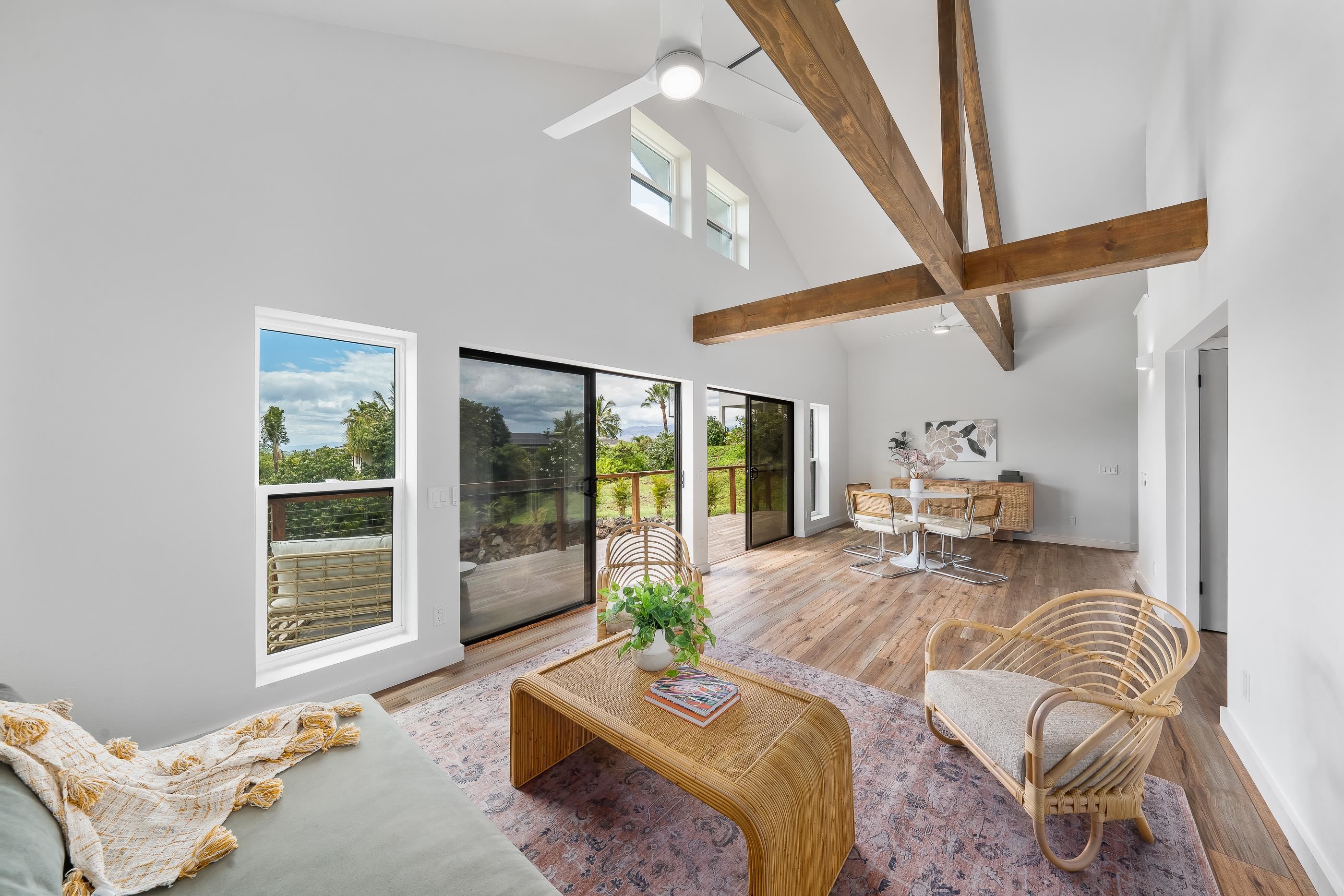 820 Kupulau Drive Kihei, HI 96753 - Photo 41 of 50 a living room with furniture and a large window