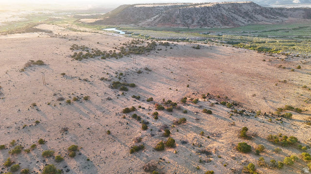 123 Teasdale Powerline Road Torrey, UT 84773 - Photo 12 of 62 View of mountain backdrop featuring a desert landscape and rural landscape