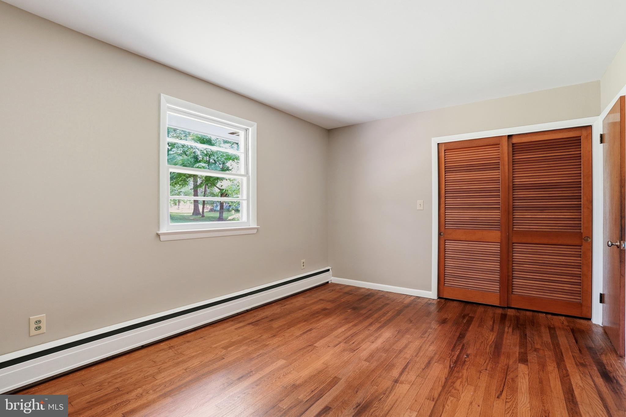 486 Derstine Road Hatfield, PA 19440 - Photo 20 of 53 wooden floor in an empty room with a window