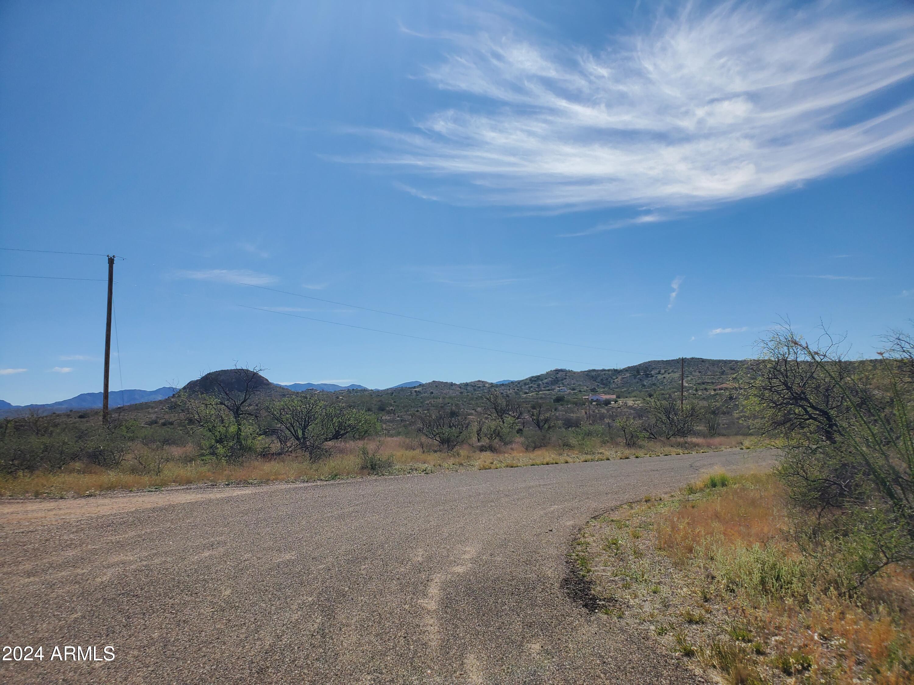 173 Via Ventosa, Unit 98 Rio Rico, AZ 85648 - Photo 3 of 10 a view of a mountain with an outdoor space
