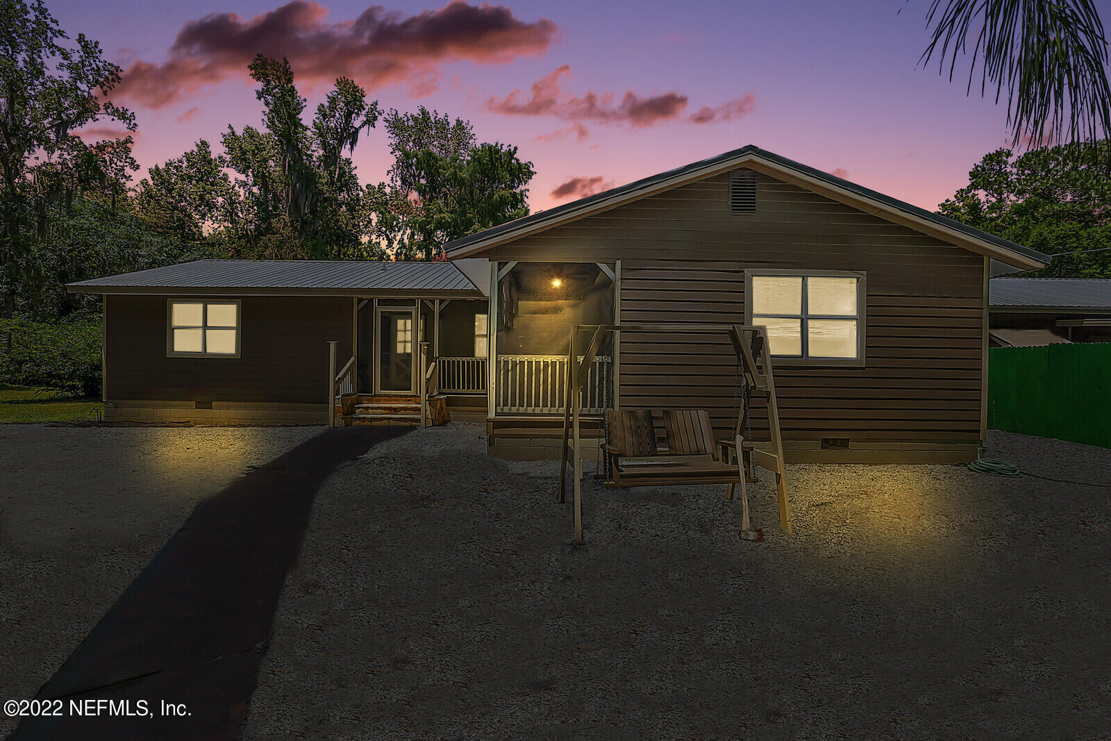 574 Clifton Road Crescent City, FL 32112 - Photo 1 of 38 a front view of a house with a yard
