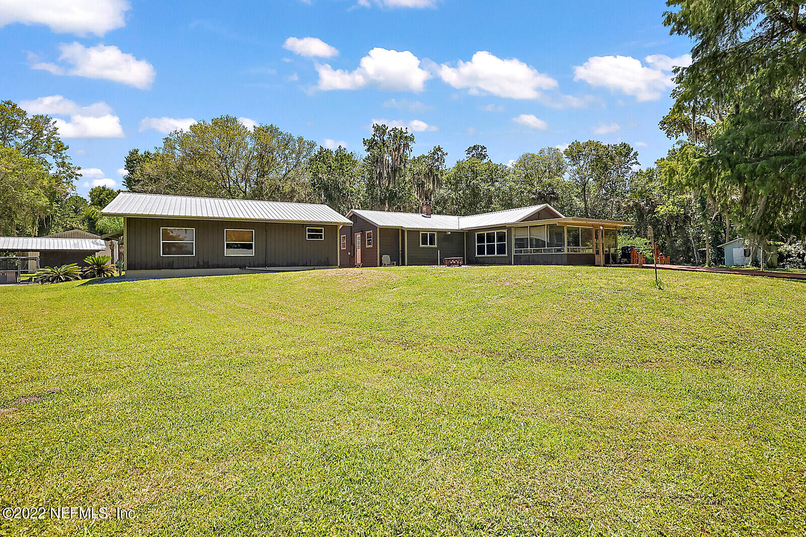 574 Clifton Road Crescent City, FL 32112 - Photo 31 of 38 a view of a swimming pool with an ocean view