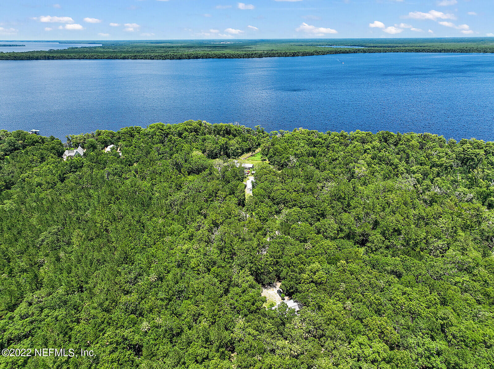 574 Clifton Road Crescent City, FL 32112 - Photo 5 of 38 a view of a lake from a yard