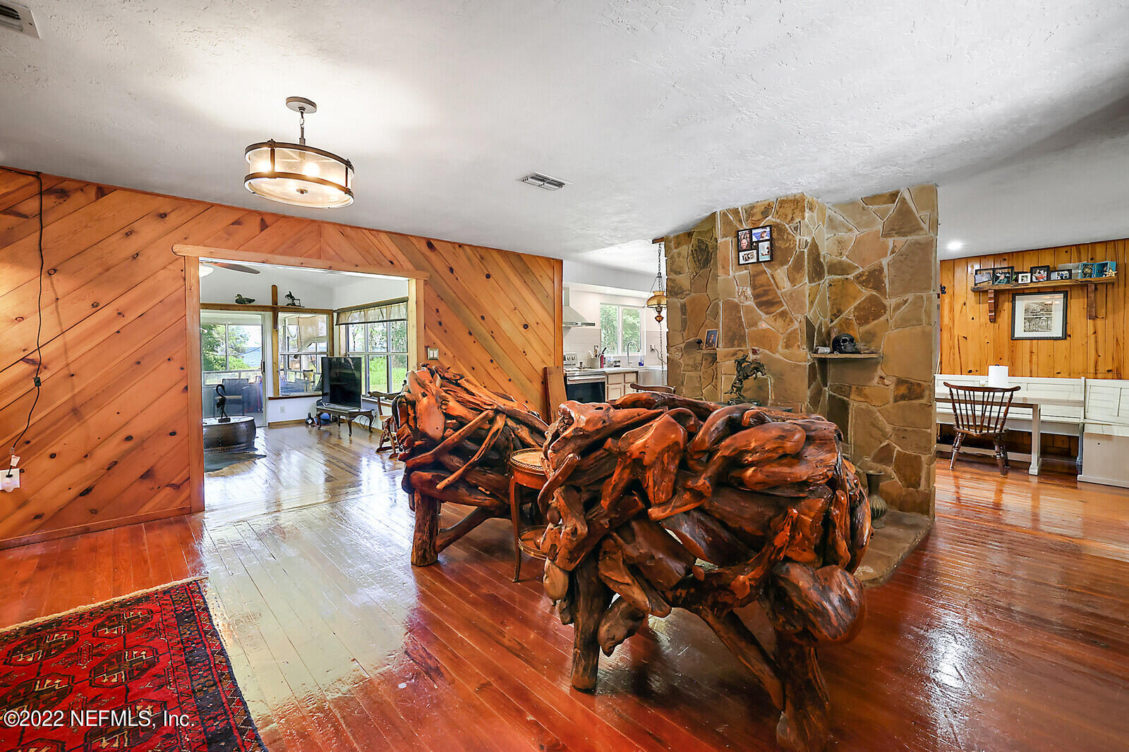 574 Clifton Road Crescent City, FL 32112 - Photo 6 of 38 a very nice looking room with many windows and furniture