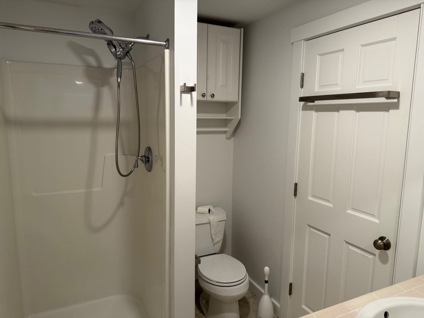 106 Old South Road, Unit A B Nantucket, MA 02554 - Photo 23 of 24 a bathroom with a granite countertop toilet and a shower
