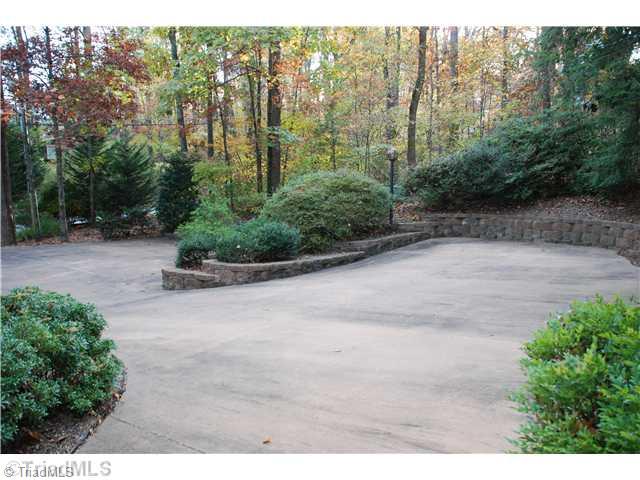 5500 East Rockingham Road Greensboro, NC 27407 - Photo 3 of 16 Exterior Front. Two level driveway parking is wonderful when entertaining or area for basketball.