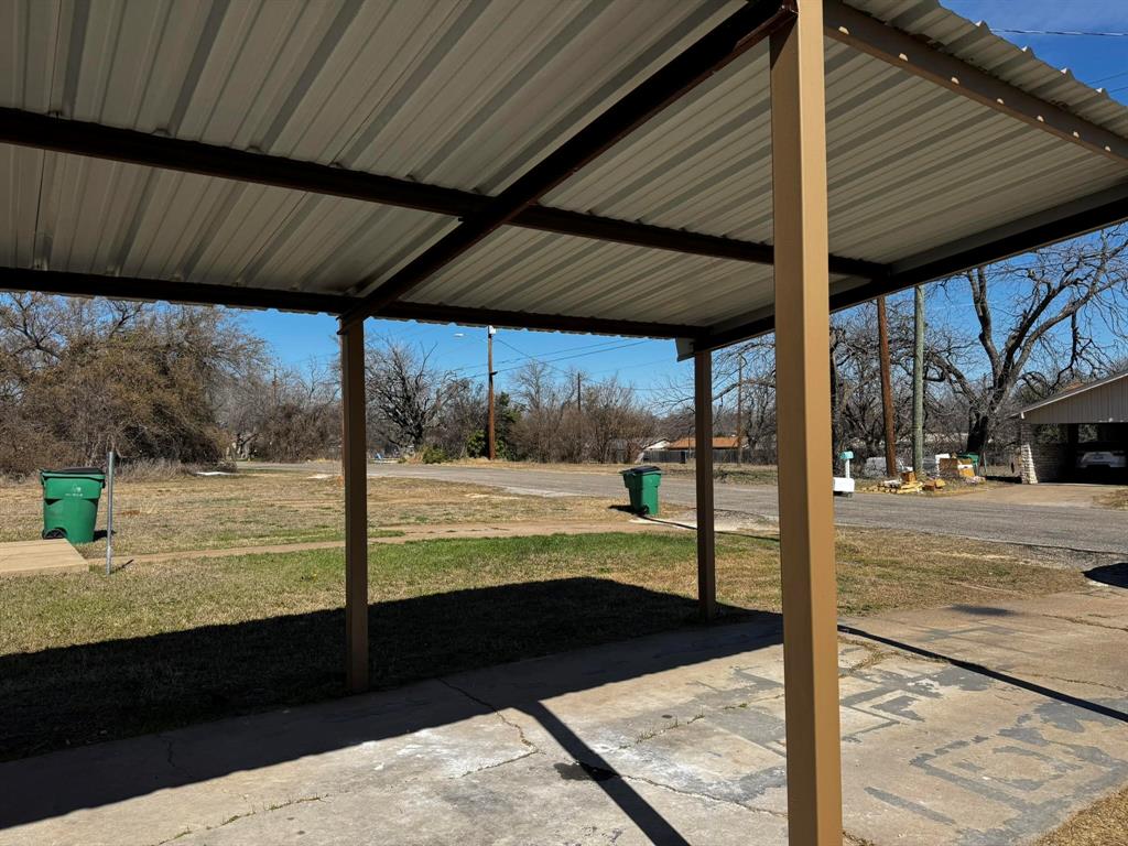 210 Reta Street Stephenville, TX 76401 - Photo 7 of 13 a view of a street with an outdoor space