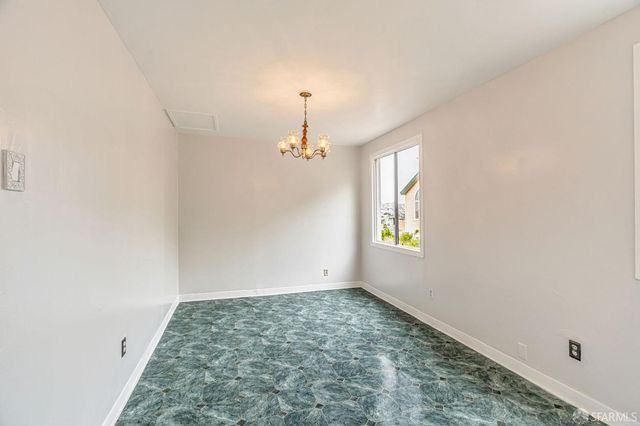 a view of a room with a window