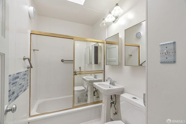 a view of hallway with windows