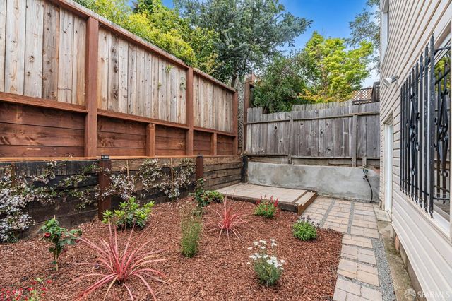 a view of a back yard of the house