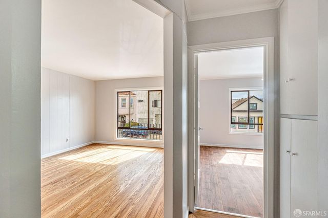 a view of an empty room and window