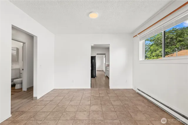 a view of an empty room and window