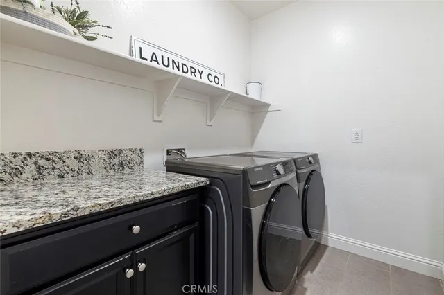a swimming pool with outdoor seating and yard