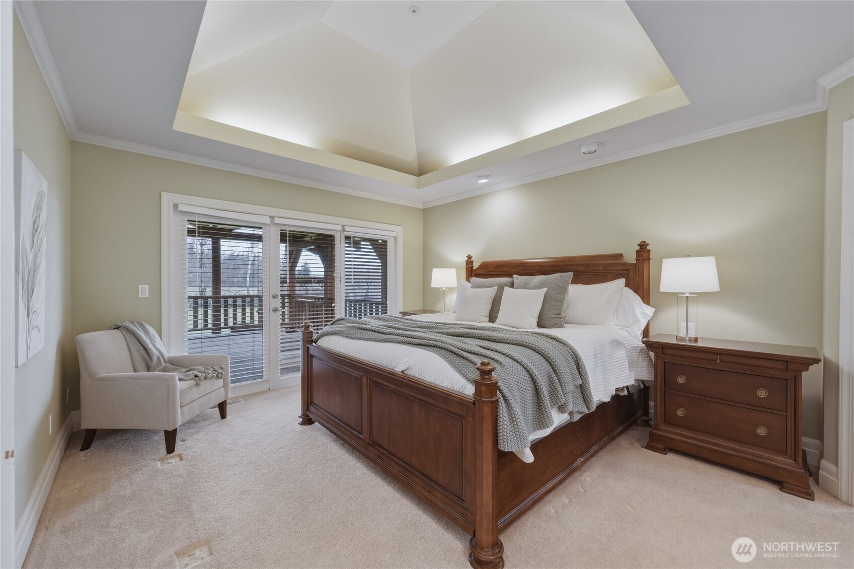 7349 Old Guide Road Ferndale, WA 98248 - Photo 16 of 40 a spacious bedroom with a bed and a couch