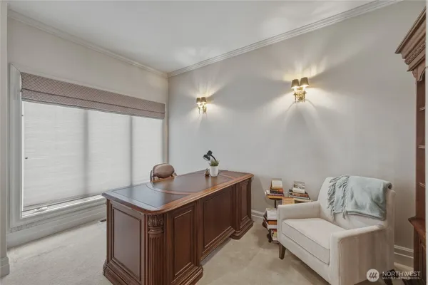 a living room with a couch and a window