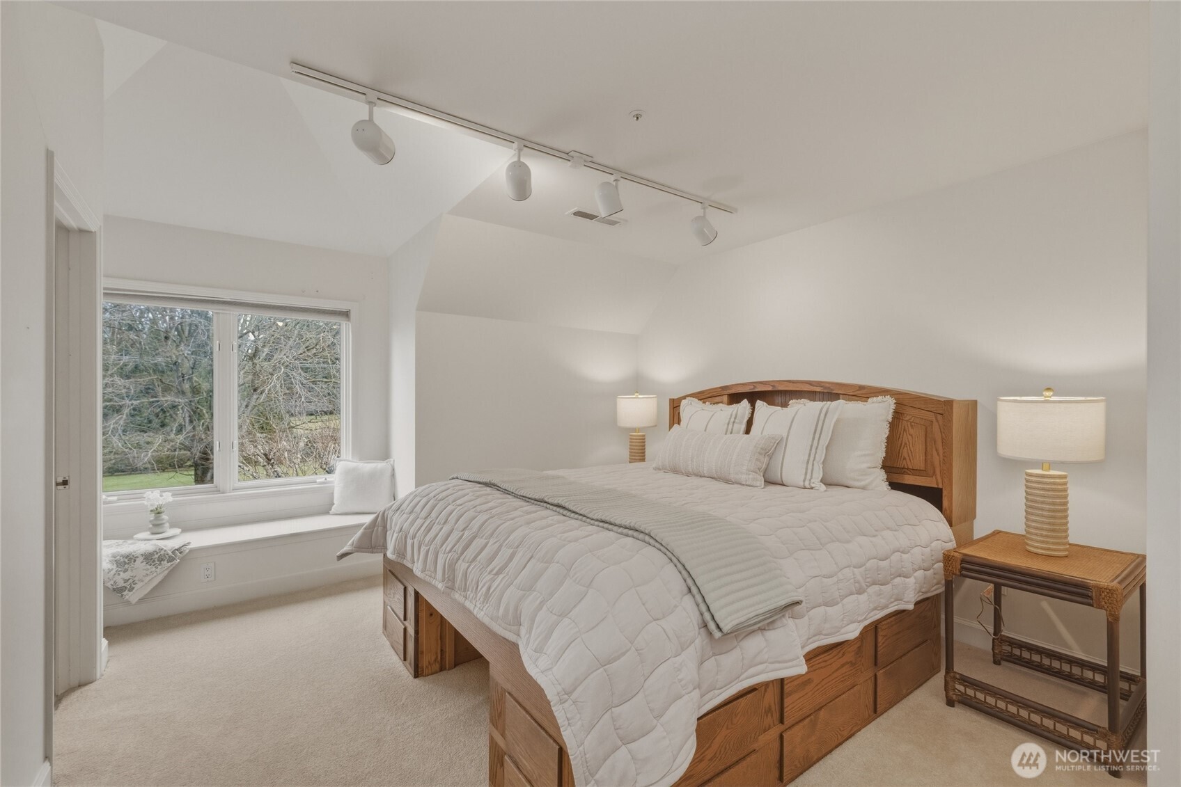 7349 Old Guide Road Ferndale, WA 98248 - Photo 23 of 40 a bedroom with a bed and a large window