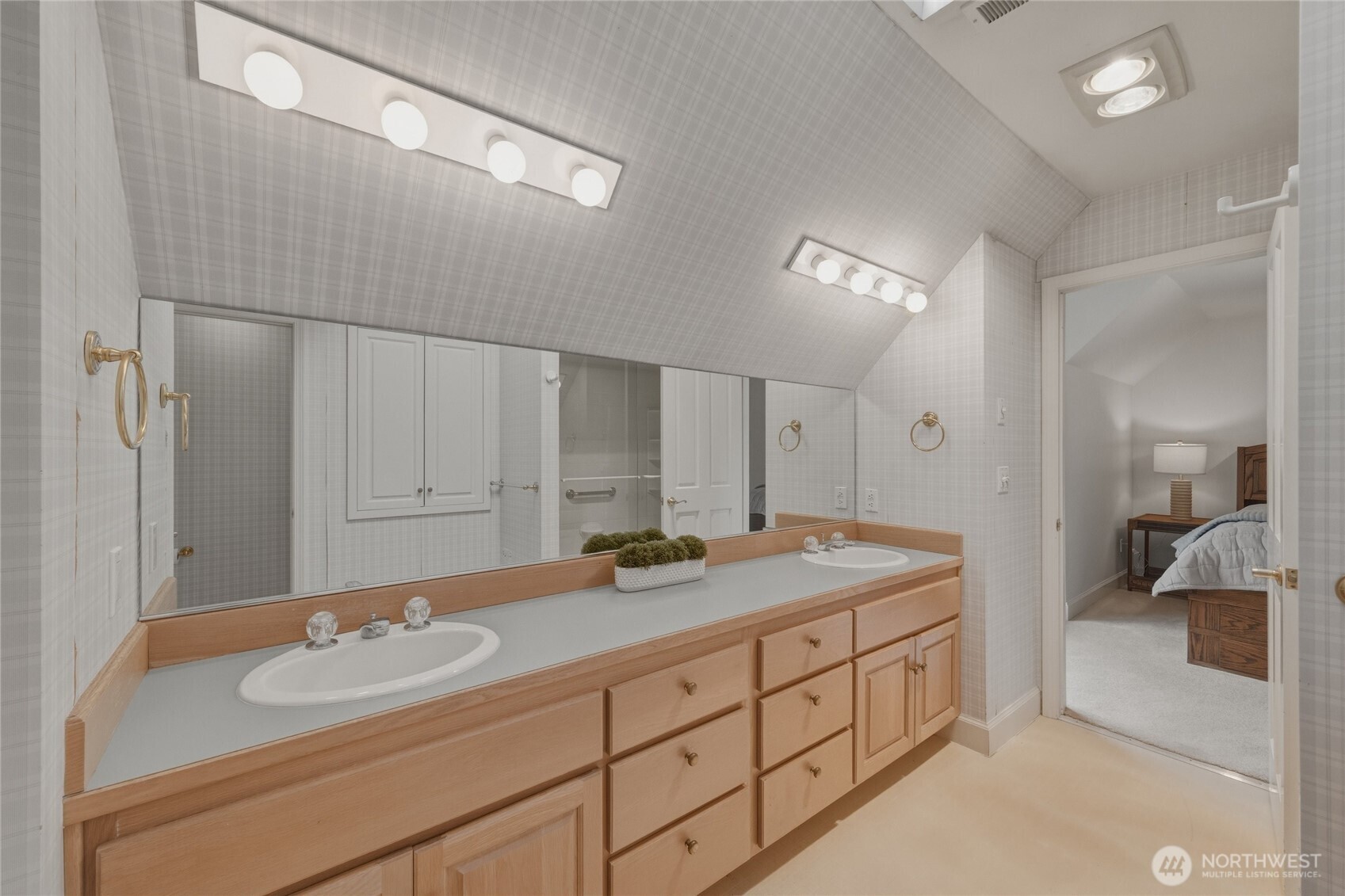 7349 Old Guide Road Ferndale, WA 98248 - Photo 24 of 40 a bathroom with a sink and a mirror