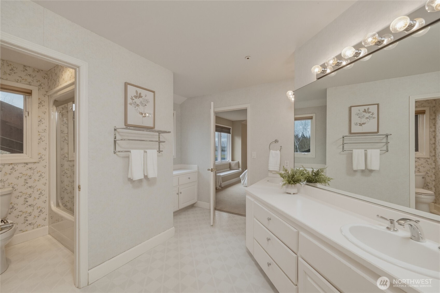 7349 Old Guide Road Ferndale, WA 98248 - Photo 26 of 40 a spacious bathroom with a double vanity sink a mirror and a shower