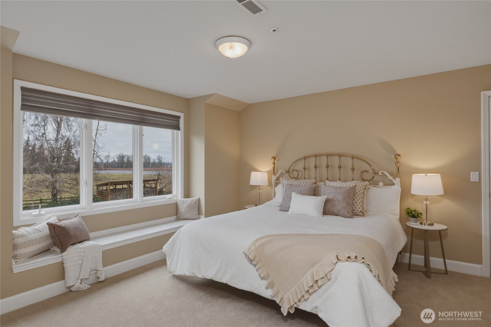 7349 Old Guide Road Ferndale, WA 98248 - Photo 27 of 40 a bedroom with a bed and a large window