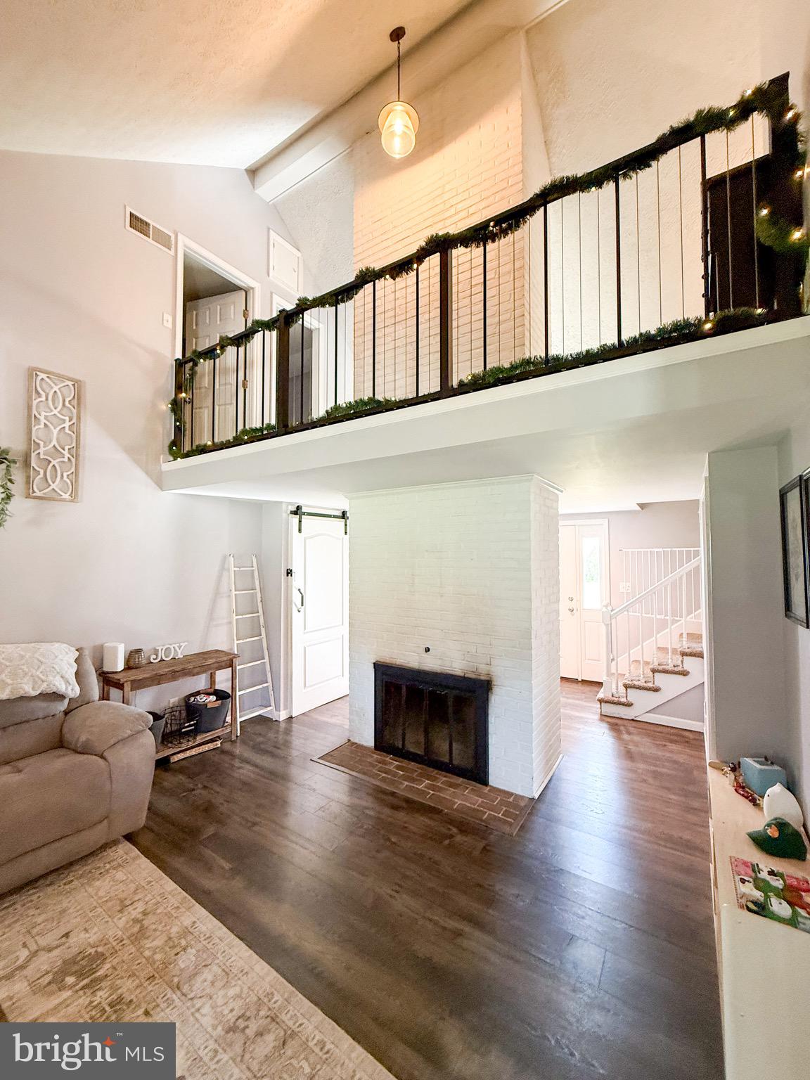 2333 Sollenberger Road Chambersburg, PA 17202 - Photo 8 of 61 Vaulted ceilings with large brick fireplace