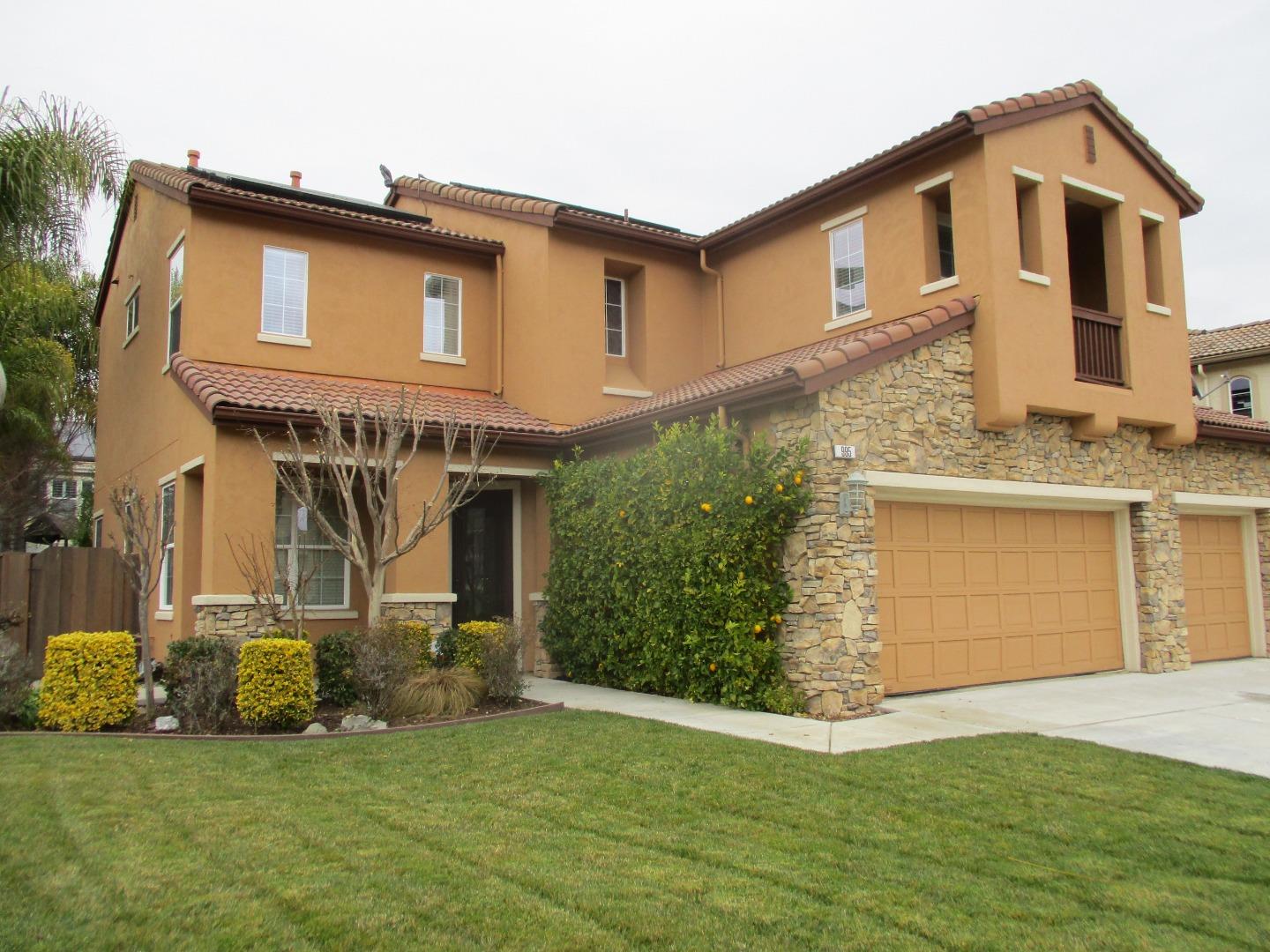 995 Brook Way Gilroy, CA 95020 - Photo 1 of 42 a front view of a house with a yard