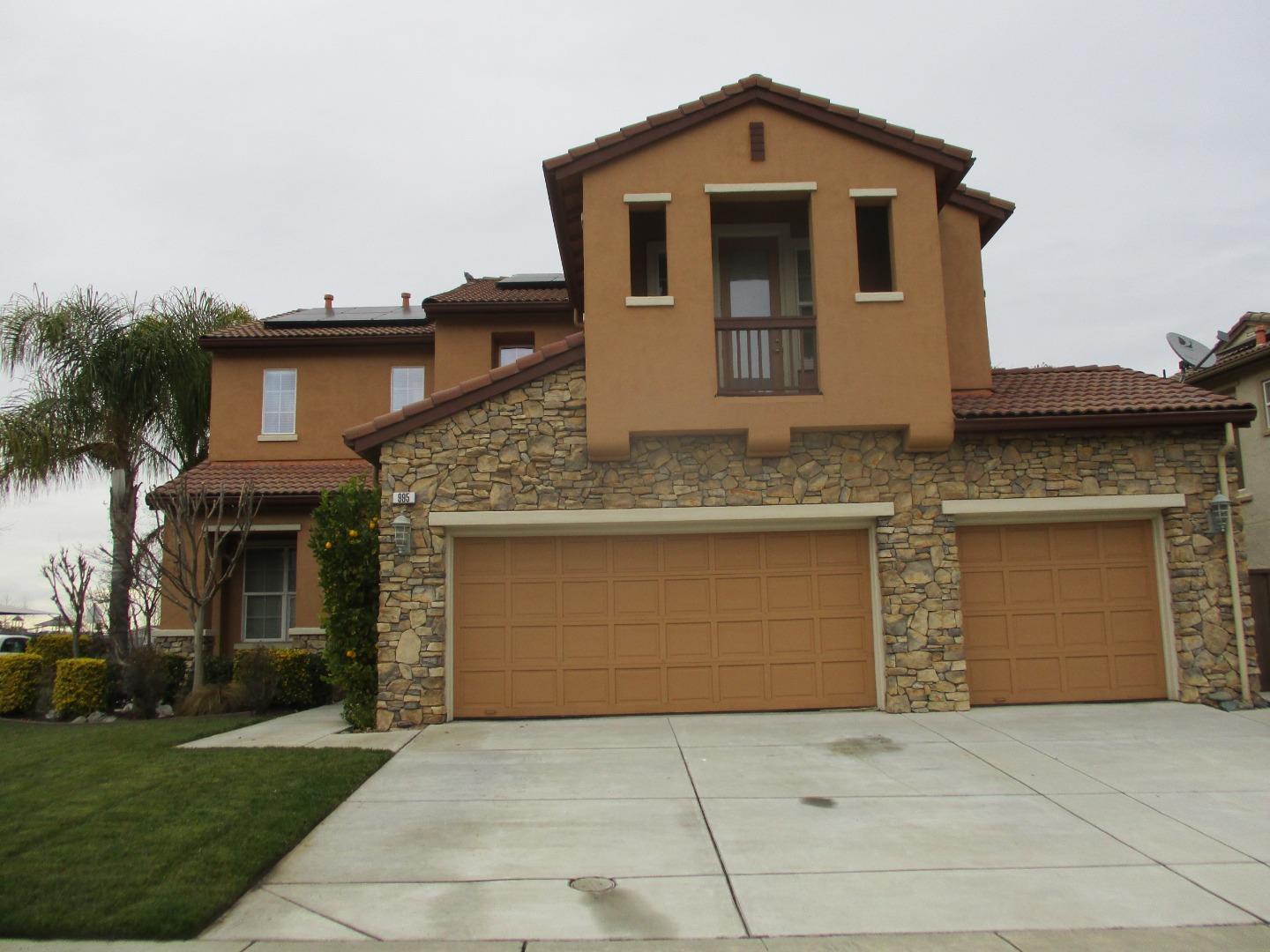 995 Brook Way Gilroy, CA 95020 - Photo 2 of 42 a house view with a sink and yard
