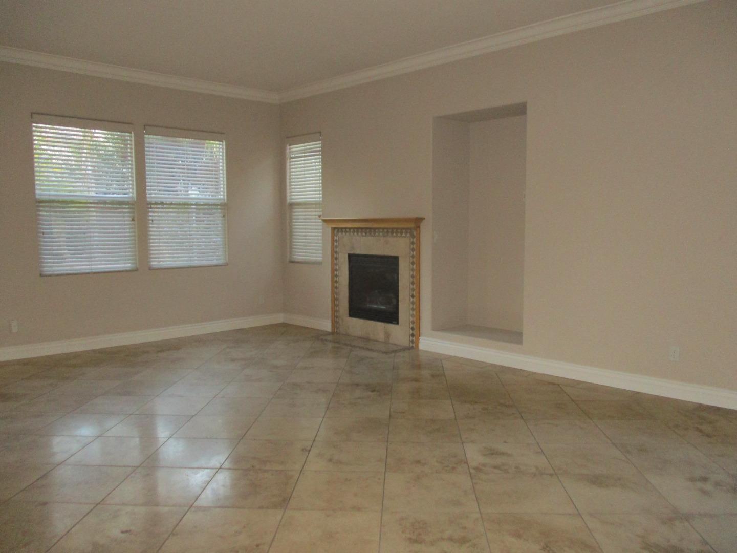995 Brook Way Gilroy, CA 95020 - Photo 13 of 42 an empty room with windows