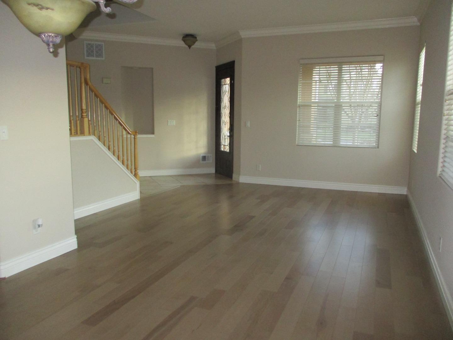 995 Brook Way Gilroy, CA 95020 - Photo 16 of 42 a view of an entryway with wooden floor