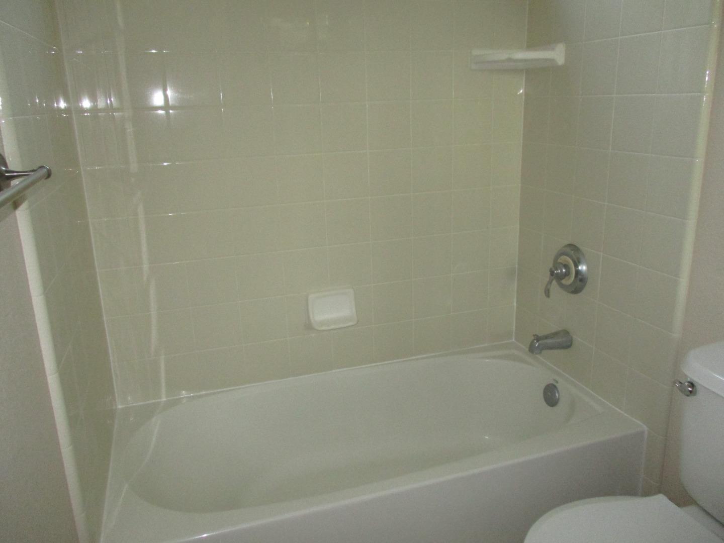 995 Brook Way Gilroy, CA 95020 - Photo 35 of 42 a close view of a bathtub in bathroom