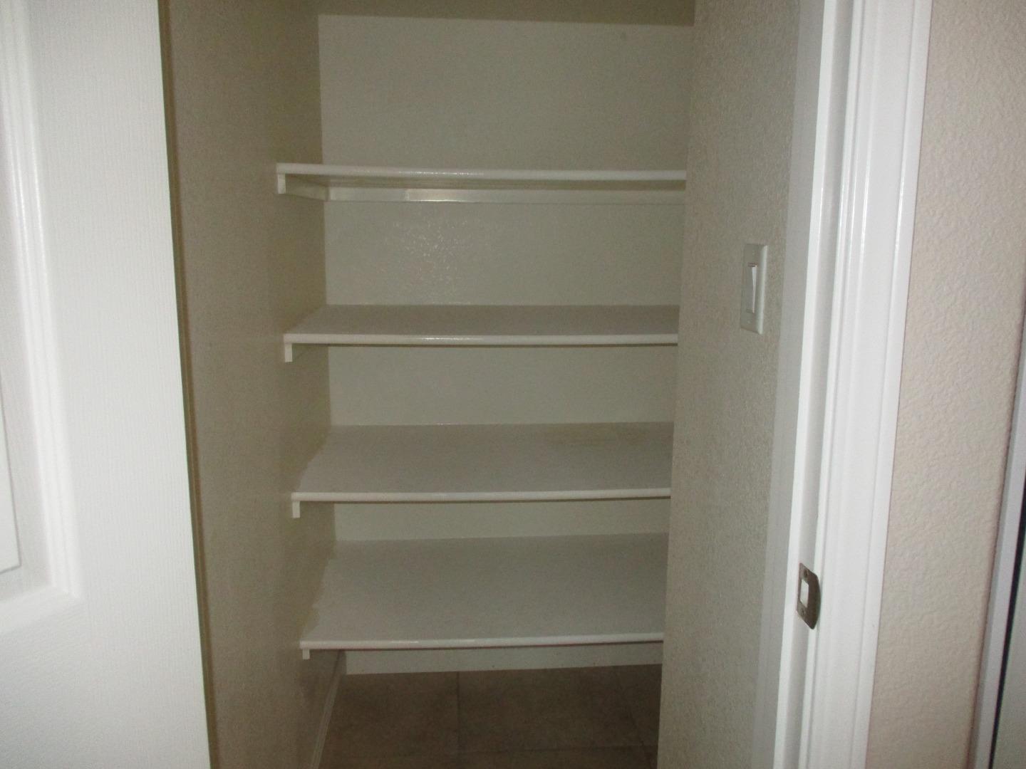 995 Brook Way Gilroy, CA 95020 - Photo 10 of 42 a view of walk in closet with empty racks