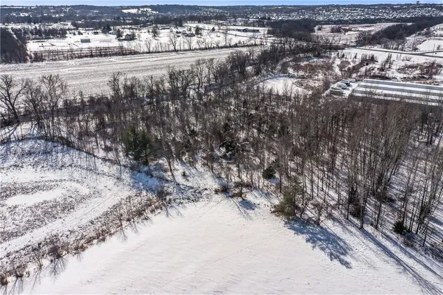 $450,000 | 115 East Old Us 40 Highway, Grain Valley, MO 64029