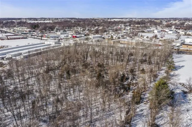 $450,000 | 115 East Old Us 40 Highway, Grain Valley, MO 64029