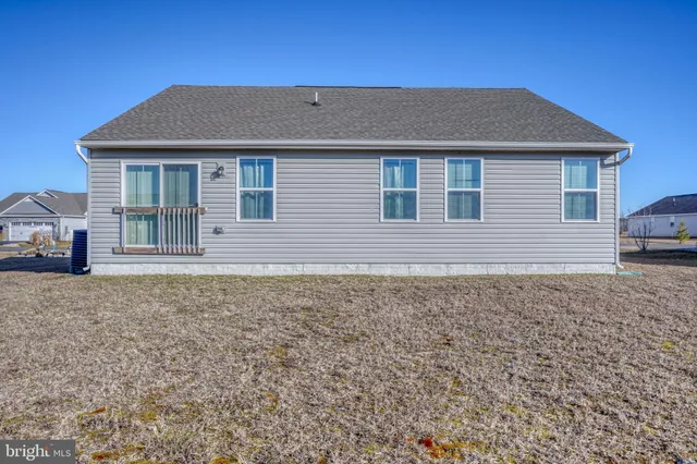 a room with furniture and wooden floor