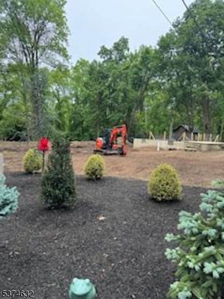 525 Stanton Station Road Flemington, NJ 08822 - Photo 2 of 16 a backyard of a house with a table and a chairs