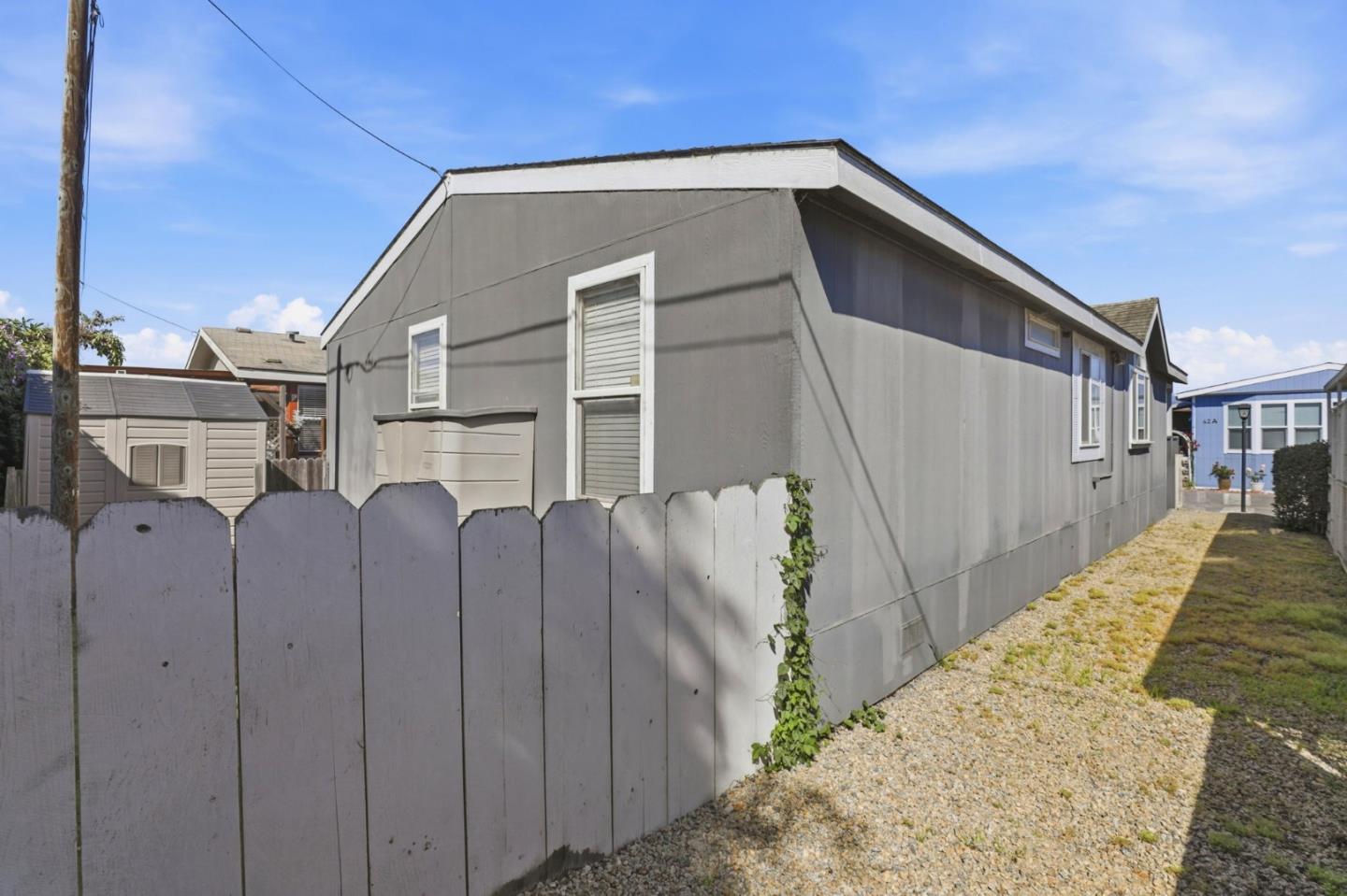 20 Russell Road, Unit 8 Salinas, CA 93906 - Photo 25 of 38 a back view of a house with a backyard