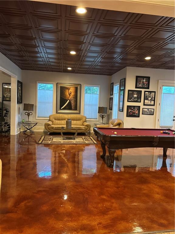 Undisclosed Address Milton, GA 30004 - Photo 101 of 118 a living room with furniture a pool table and a wooden floor