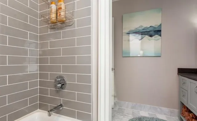 an aerial view of a residential houses with outdoor space and street view