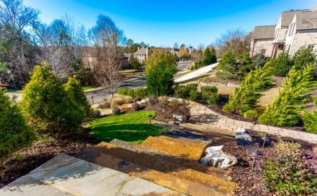 a stove top oven sitting inside of a kitchen