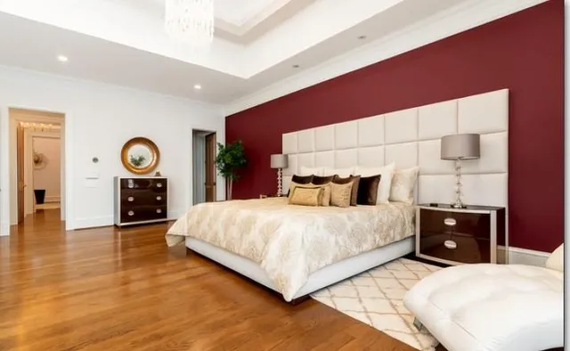 a spacious bathroom with a granite countertop sink mirror and a