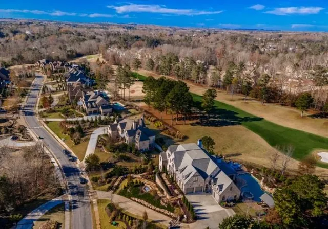 a view of parking garage with cars