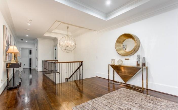 Undisclosed Address Milton, GA 30004 - Photo 50 of 118 a view of a room that has a table and chairs