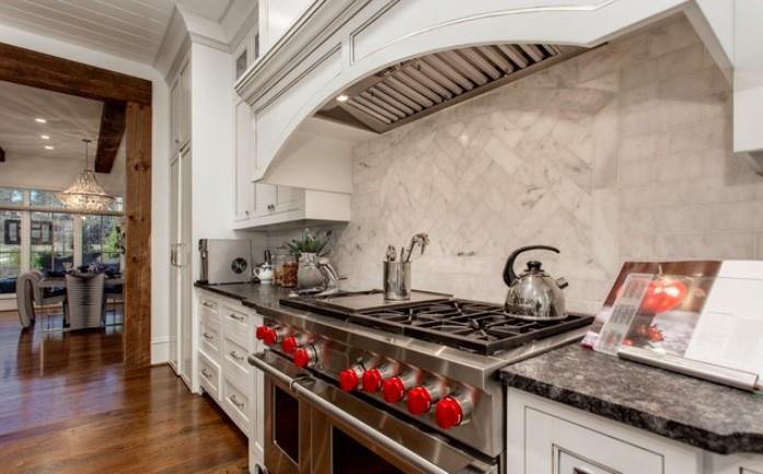 Undisclosed Address Milton, GA 30004 - Photo 55 of 118 a stove top oven sitting inside of a kitchen