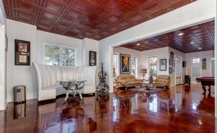 Undisclosed Address Milton, GA 30004 - Photo 57 of 118 a living room with lots of furniture tv and wooden floor