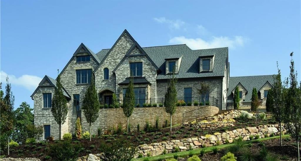 Undisclosed Address Milton, GA 30004 - Photo 66 of 118 a front view of a house with a yard